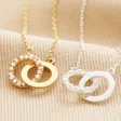 Interlocking Pearl and Crystal Hoops Necklace in Silver next to gold version