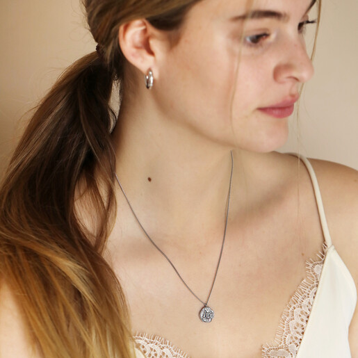 Stainless Steel Aquarius Pendant Necklace On Model