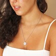 Brunette model wearing the Stainless Steel Libra Pendant Necklace