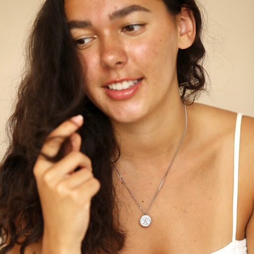 Necklace on Model Stainless Steel Aries Pendant Necklace on dark haired Model