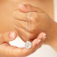Model holding the Stainless Steel Libra Pendant Necklace