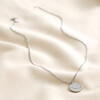 Full Chain of Stainless Steel Virgo Pendant Necklace on Neutral Coloured Fabric