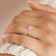 Close up of model wearing the Pink Enamel Daisy Ring in Silver