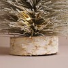 Close up of base on Large Light Up LED Tree Ornament against natural coloured background