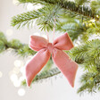 Rose Pink Velvet Bow Hanging Decoration hanging from Christmas tree