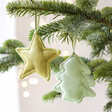 Plush Green Star Hanging Decoration and Christmas tree decoration hanging from Christmas tree