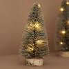 Small Light Up LED Tree Ornament against natural coloured background with lights turned on