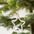 Woven Rope Star Hanging Decoration hanging from Christmas tree