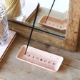 Celestial Incense Holder in lifestyle shot on top of wooden surface