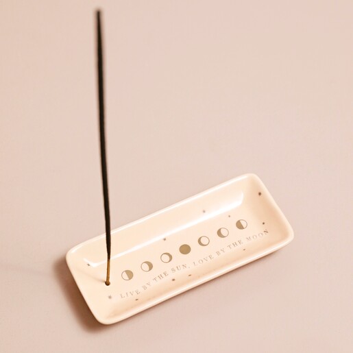 Celestial Incense Holder Celestial Incense Holder with incense stick inside against neutral coloured background