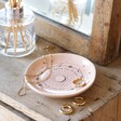 Celestial Trinket Dish on top of wooden countertop with jewellery inside and reed diffuser in background