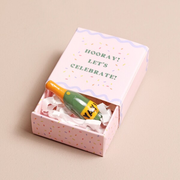Gift This Tiny Matchbox Ceramic Champagne Token To A Graduating Loved One