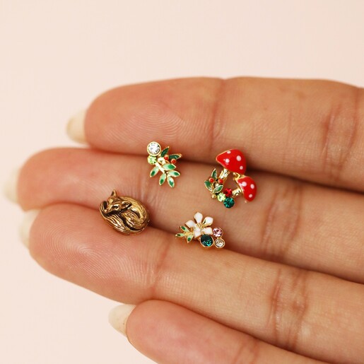 Model Holding Earrings Model Holding Set of Four Enamel Woodland Stud Earrings in Gold