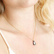 Close Up of Model Wearing Penguin Pendant Necklace in Gold