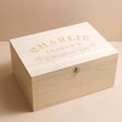 Personalised Bold Name Wooden Christmas Eve Box on Beige Surface