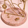 Close up of base on feminine figure Personalised Jewellery Stand with Terrazzo Base with jewellery on