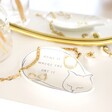 Cat Quote Trinket Dish with jewellery on top and around on top of white coloured backdrop
