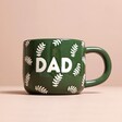Ceramic Green Leafy Dad Mug in front of beige coloured background