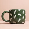 Ceramic Green Leafy Dad Mug in front of beige background