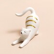 Ceramic Stretching Cat Ring Holder on Pink Surface