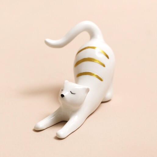 Ceramic Stretching Cat Ring Holder Ceramic Stretching Cat Ring Holder on Pink Surface