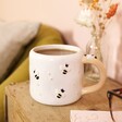 Irregular Ceramic Bee Mug on top of wooden counter with mug behind it