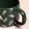 Close up of handle on Ceramic Green Leafy Papa Mug