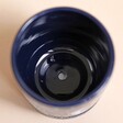 Inside of Midnight Blue Sun and Moon Planter and Tray with beige background