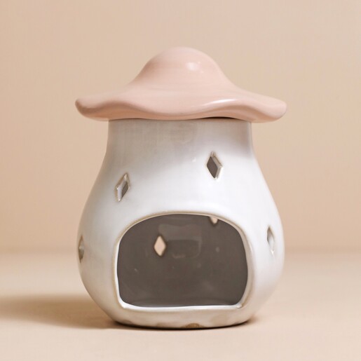 Pink Ceramic Toadstool Wax Burner Pink Ceramic Toadstool Wax Burner without candle inside against beige coloured backdrop