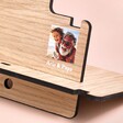 Close Up of Personalisation on Personalised Photo Wooden Phone Accessory Stand on Beige Surface