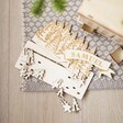 Topper of Personalised Wooden Forest Cutout Advent Calendar dismantled on floor