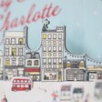 Close up of houses on Personalised Wooden Market Cutout Advent Calendar topper