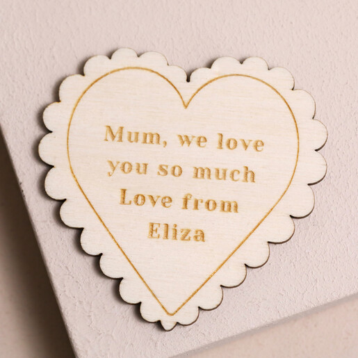 Personalised Wooden Scalloped Heart Token with plain pink background