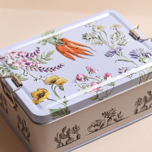 Top of Tin Lid of In The Garden Vegan Hand Care and Essentials Tin