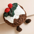 Jellycat Amuseable Christmas Pudding Soft Toy from above on top of neutral backdrop