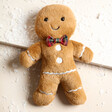 Jellycat Jolly Gingerbread Fred Soft Toy on snow covered surface