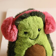 Close up of Jellycat Toastie Amuseable Avocado Soft Toy with neutral backdrop