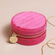 Quilted Velvet Mini Round Travel Jewellery Case in Pink on Neutral Tone Surface