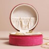 Interior of Lid of Mini Quilted Velvet Round Jewellery Case in Fuschia