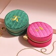 Personalised Quilted Velvet Mini Round Travel Jewellery Case in Green and Pink on Beige Surface