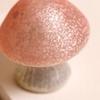 Close Up of Cap on Small Pink Glass Mushroom Light