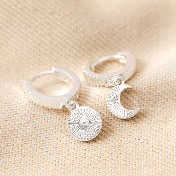 Moon and Sun Huggie Hoop Earrings in Silver Moon and Sun Huggie Hoop Earrings in Silver