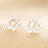 Sterling Silver Crystal Sunbeam Stud Earrings on Beige Fabric