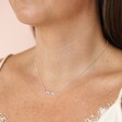 Close up of Sterling Silver Pastel Crystal Horizontal Bar Necklace on model
