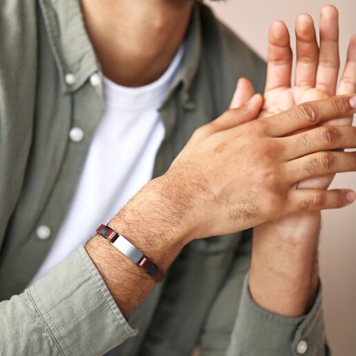 Bracelet on Model Personalised Men's Double Leather Bracelet on model with hands held together