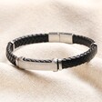 Personalised Men's Stainless Steel Feature Braided Leather Bracelet in Black on top of beige coloured fabric