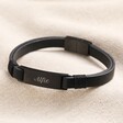 Personalised Men's Double Leather Bracelet in black on top of beige coloured fabric