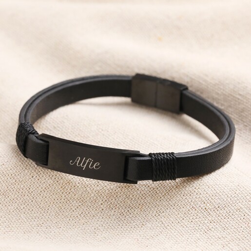 Personalised Men's Double Leather Bracelet in Black Personalised Men's Double Leather Bracelet in black on top of beige coloured fabric