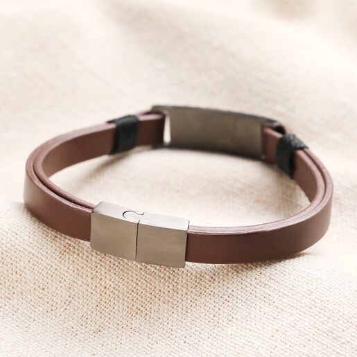 Close Up of Clasp Close up of clasp on Personalised Men's Double Leather Bracelet in brown on beige fabric
