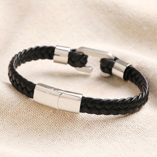 Stainless Steel Hook Feature Braided Leather Bracelet in Black Clasp on Stainless Steel Hook Feature Braided Leather Bracelet in Black on top of beige coloured backdrop
